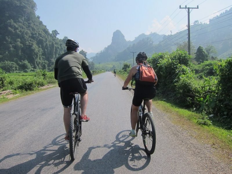 Voices of the Highlands: Embarking on an Authentic Ethnic Village E-Bike Tour in Laos